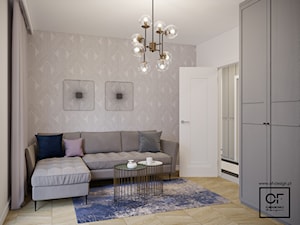 Eleganckie wnętrza w domu jednorodzinnym - Średnie z sofą białe szare biuro, styl glamour - zdjęcie od O.Fiedorowicz