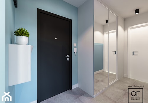 Małe mieszkanie z nutą ekstrawagancji - Średni niebieski hol / przedpokój, styl nowoczesny - zdjęcie od O.Fiedorowicz