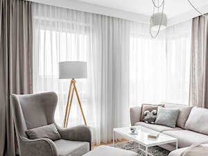 Mieszkanie w stylu Audrey - Mały biały salon, styl skandynawski - zdjęcie od MΛKΛ Studio
