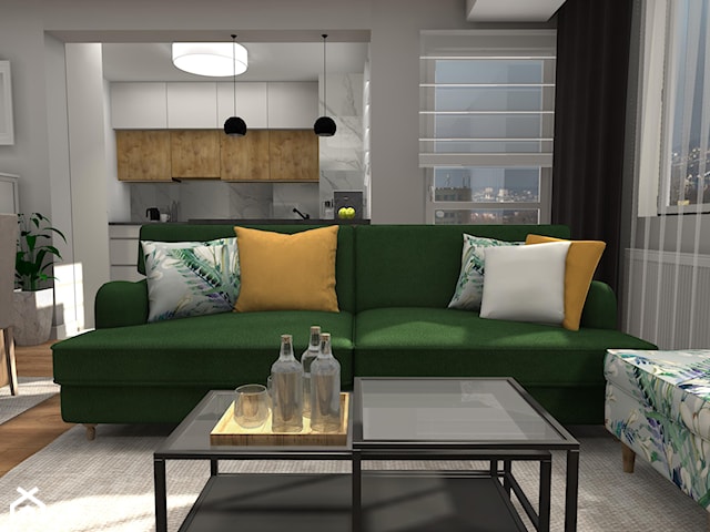 Zielona kanapa w poznańskim mieszkaniu