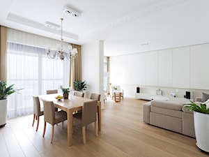 Apartament na Żoliborzu - Duży biały salon z jadalnią, styl nowoczesny - zdjęcie od Izabela Rydygier Architektura Wnętrz