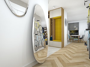 rowerowe mieszkanie - Średni z wieszakiem biały hol / przedpokój, styl nowoczesny - zdjęcie od RedCubeDesign projektowanie wnętrz