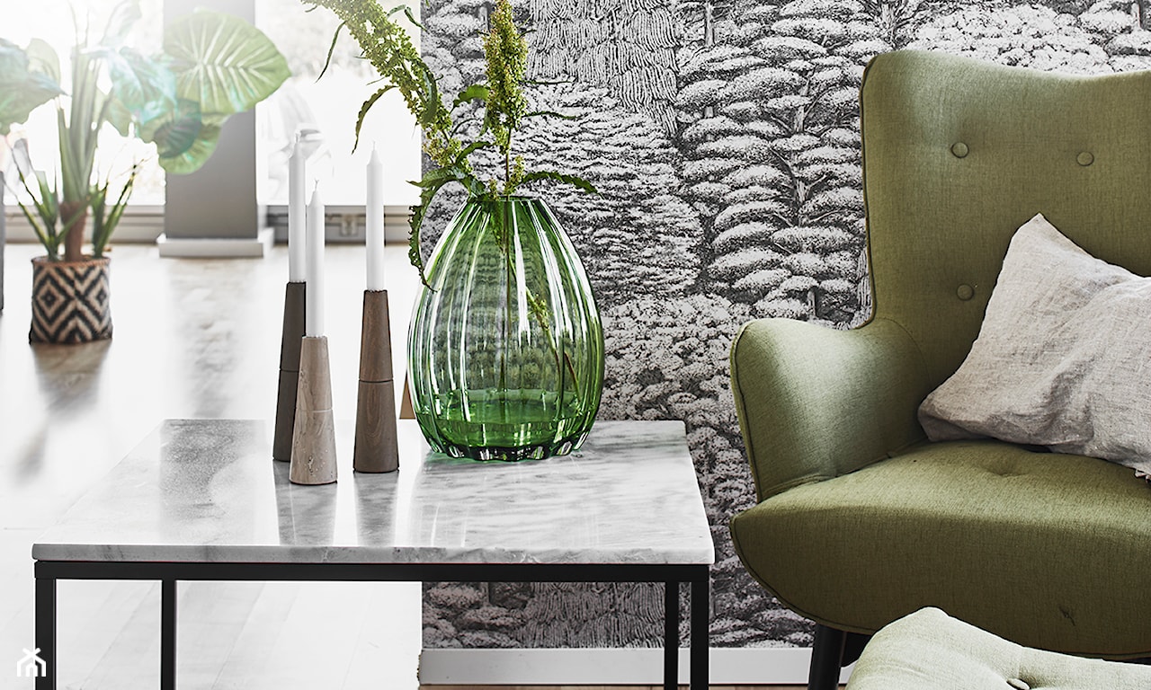 nowoczesny salon z zielonym fotelem