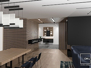 Projekt wnętrza domu jednorodzinnego - Duża beżowa czarna jadalnia w salonie, styl nowoczesny - zdjęcie od NKW - wnętrza