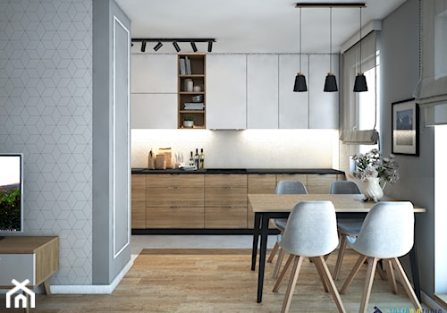Salon z kuchnią - Średnia otwarta z kamiennym blatem szara z zabudowaną lodówką kuchnia jednorzędowa ... - zdjęcie od Totius Studio