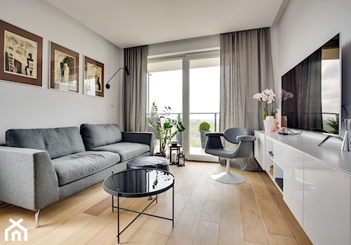 Mieszkanie wg autorstwa studia KAST DESIGN z Paryża - Mały biały salon, styl nowoczesny - zdjęcie od Radosław Sobik Fotografia