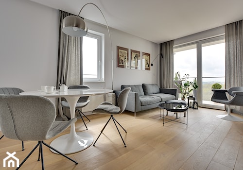 Mieszkanie wg autorstwa studia KAST DESIGN z Paryża - Średnia beżowa jadalnia w salonie, styl nowoczesny - zdjęcie od Radosław Sobik Fotografia