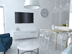 Mieszkanie Warszawa - Średnia biała jadalnia w salonie w kuchni, styl skandynawski - zdjęcie od Studio WYMIAR