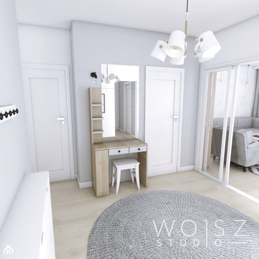 Mieszkanie w Gdańsku · Projekt - Średni z wieszakiem szary hol / przedpokój, styl skandynawski - zdjęcie od WOJSZ studio