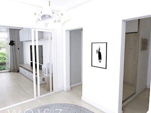 Mieszkanie w Gdańsku · Projekt - Duży z wieszakiem biały hol / przedpokój, styl skandynawski - zdjęcie od WOJSZ studio