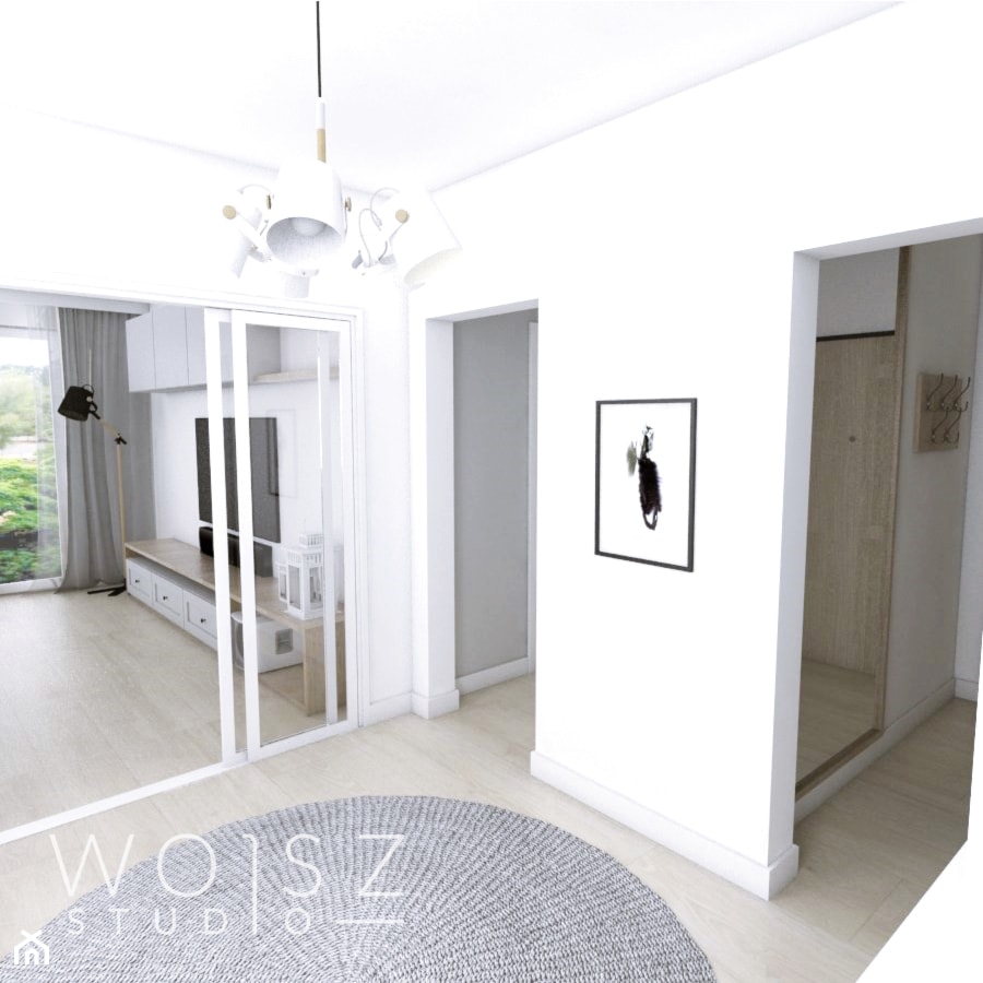 Mieszkanie w Gdańsku · Projekt - Duży z wieszakiem biały hol / przedpokój, styl skandynawski - zdjęcie od WOJSZ studio