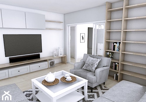 Mieszkanie w Gdańsku · Projekt - Mały biały szary salon z bibiloteczką, styl skandynawski - zdjęcie od WOJSZ studio