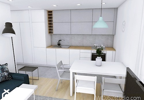 Mieszkanie w Gdańsku · Projekt - Średnia z salonem biała szara z zabudowaną lodówką kuchnia jednorzędowa, styl nowoczesny - zdjęcie od WOJSZ studio