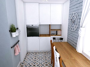 Dom w Różynach · Projekt - Średnia zamknięta biała szara z zabudowaną lodówką kuchnia jednorzędowa z oknem, styl nowoczesny - zdjęcie od WOJSZ studio