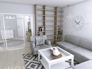 Mieszkanie w Gdańsku · Projekt - Średni szary salon z bibiloteczką, styl skandynawski - zdjęcie od WOJSZ studio