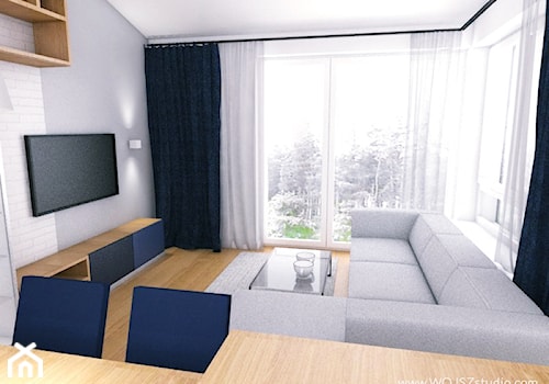 Mieszkanie w Gdyni · Projekt - Mały biały salon z jadalnią, styl industrialny - zdjęcie od WOJSZ studio