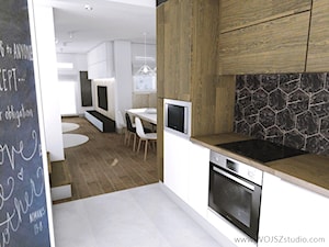 Dom w Gdańsku · Projekt - Średnia otwarta z salonem brązowa czarna z zabudowaną lodówką kuchnia jednorzędowa, styl nowoczesny - zdjęcie od WOJSZ studio