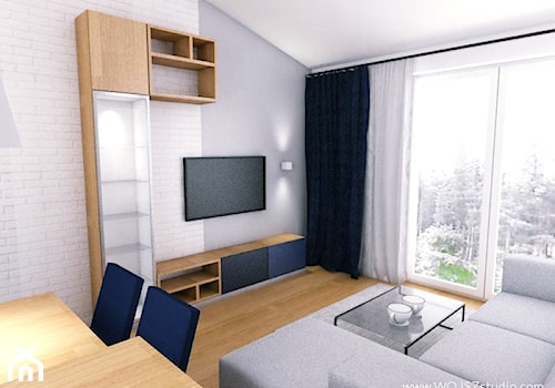 Mieszkanie w Gdyni · Projekt - Mały biały szary salon z jadalnią z tarasem / balkonem, styl industrialny - zdjęcie od WOJSZ studio