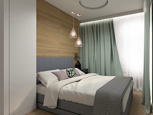 Sypialnia z drewnem na ścianie - zdjęcie od STUDIO PNIAK