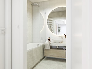 Łazienka z okrągłym lustrem - zdjęcie od STUDIO PNIAK