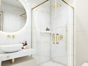 złote dodatki w łazience - zdjęcie od STUDIO PNIAK