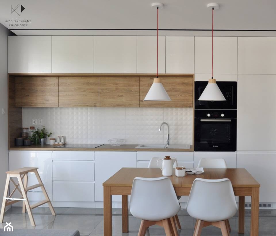 Mieszkanie Kraków,50m2. Realizacja - Średnia biała jadalnia w kuchni, styl nowoczesny - zdjęcie od STUDIO PNIAK - Homebook