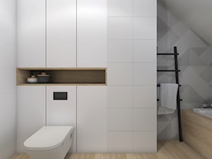 Dom jednorodzinny w Brzezie,Niepołomice - Mała na poddaszu łazienka, styl skandynawski - zdjęcie od STUDIO PNIAK