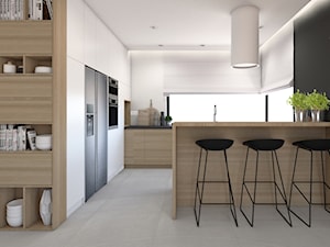biała kuchnia z drewnem - zdjęcie od STUDIO PNIAK