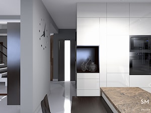 ELEGANCJA SZAROŚCI - Średnia z salonem biała czarna z zabudowaną lodówką kuchnia w kształcie litery g, styl nowoczesny - zdjęcie od SM STUDIO Projektowanie wnętrz