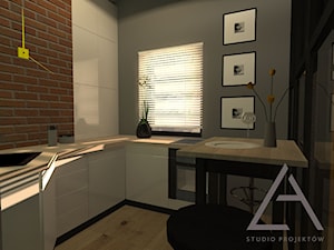 Apartament z widokiem - Średnia otwarta zamknięta kuchnia w kształcie litery l z oknem, styl minimalistyczny - zdjęcie od Studio Projektów