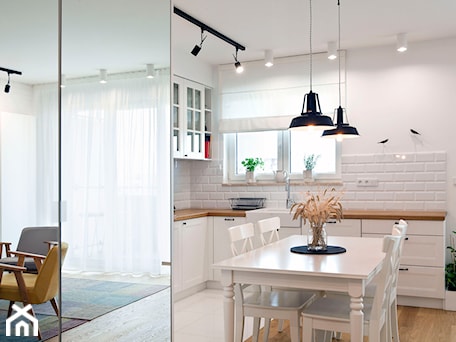 Aranżacje wnętrz - Jadalnia: Realizacja mieszkania w stylu rustykalnym - Średnia biała jadalnia w kuchni - Eno Design. Przeglądaj, dodawaj i zapisuj najlepsze zdjęcia, pomysły i inspiracje designerskie. W bazie mamy już prawie milion fotografii!
