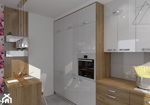 Kuchnia - Średnia otwarta z salonem biała z zabudowaną lodówką kuchnia jednorzędowa - zdjęcie od m3projekt