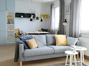 Apartament na wynajem 58m2 - Mały biały salon z jadalnią, styl skandynawski - zdjęcie od infinia