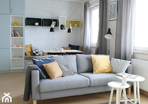 Apartament na wynajem 58m2 - Mały biały salon z jadalnią, styl skandynawski - zdjęcie od infinia