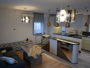 apartament na Mokotowie - Średni biały salon z kuchnią, styl nowoczesny - zdjęcie od lorenc agnieszka