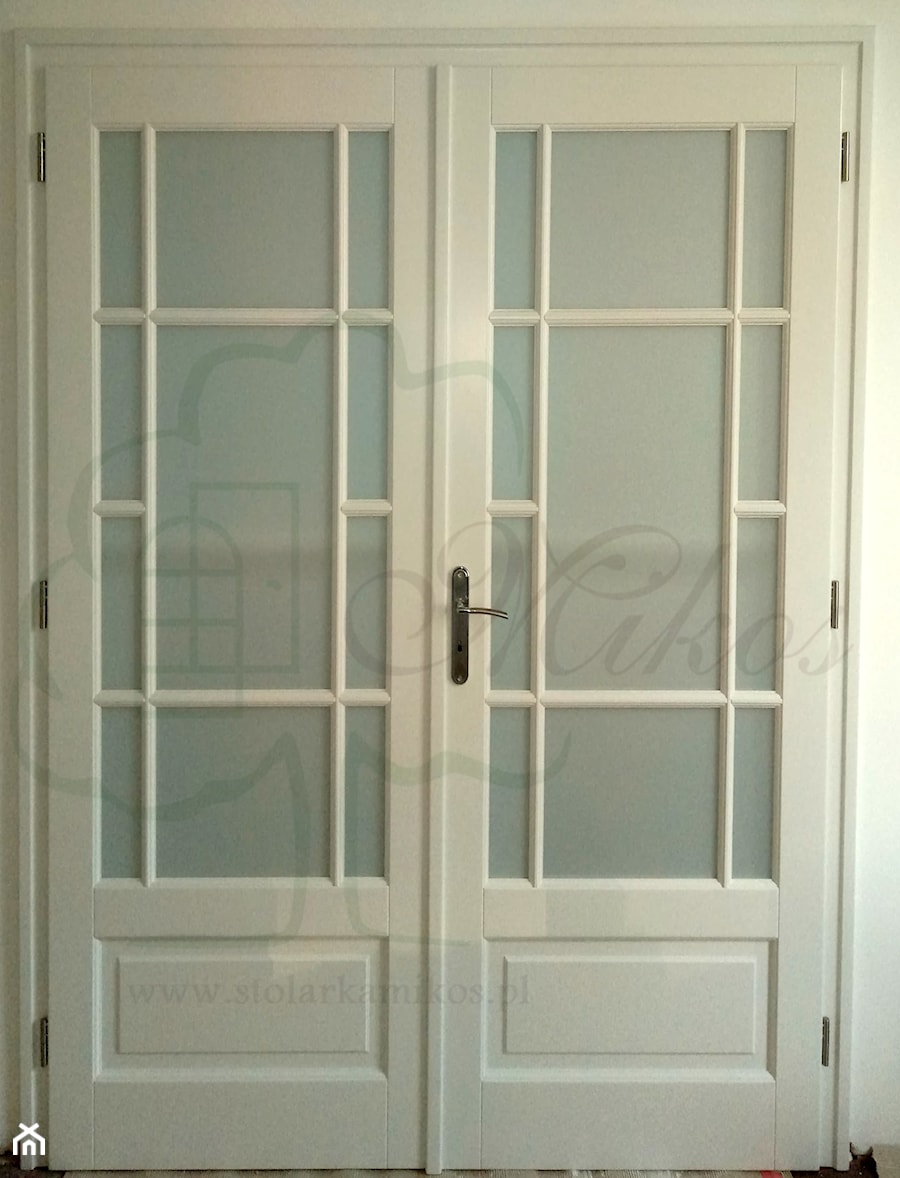 Białe drzwi wewnętrzne drewniane - zdjęcie od STOLARKA MIKOS