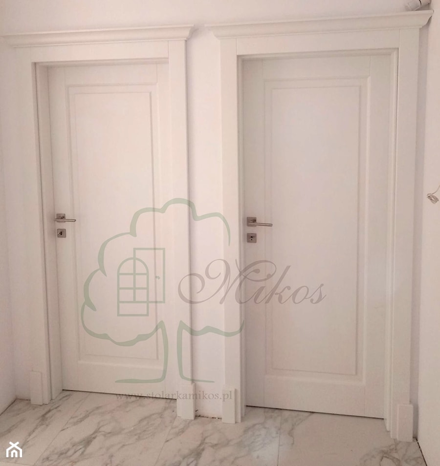 Białe drzwi wewnętrzne drewniane - zdjęcie od STOLARKA MIKOS