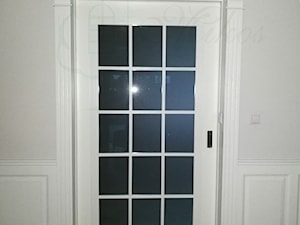 Białe drzwi dwuskrzydłowe przeszklone (drzwi francuskie) - zdjęcie od STOLARKA MIKOS