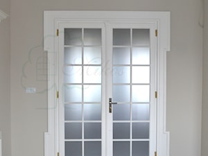 Dwuskrzydłowe wysokie drzwi francuskie białe - zdjęcie od STOLARKA MIKOS