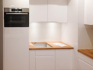 Biała kuchnia z drewnem - Kuchnia, styl nowoczesny - zdjęcie od MS-Meble Małyjurek