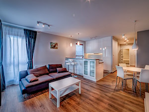 Mieszkanie pod wynajem Os. Garnizon - Średni biały szary salon z kuchnią z jadalnią, styl nowoczesny - zdjęcie od Bello Arte