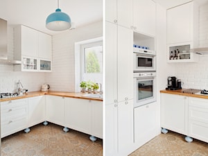 Ursynów - Średnia z salonem biała z zabudowaną lodówką z nablatowym zlewozmywakiem kuchnia w kształcie litery u - zdjęcie od Qbik Design