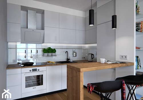 Współczesne mieszkanie - 40 m² - Mała otwarta z salonem biała z zabudowaną lodówką z nablatowym zlewozmywakiem kuchnia w kształcie litery l jednorzędowa, styl nowoczesny - zdjęcie od Doliwa Workshop