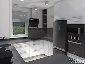 Kuchnia New - Mała otwarta biała czarna z zabudowaną lodówką z podblatowym zlewozmywakiem kuchnia w kształcie litery g z wyspą lub półwyspem z oknem z kompozytem na ścianie nad blatem kuchennym, styl minimalistyczny - zdjęcie od Anava Studio