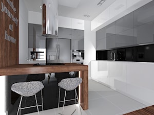 apartament - Duża otwarta biała czarna z zabudowaną lodówką z podblatowym zlewozmywakiem kuchnia w kształcie litery g z wyspą lub półwyspem z kompozytem na ścianie nad blatem kuchennym, styl nowoczesny - zdjęcie od AS DESIGN