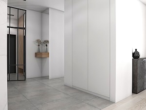 Z betonem w tle - Średni biały hol / przedpokój, styl nowoczesny - zdjęcie od Studio projektowania wnętrz''Studio Aranżacji''