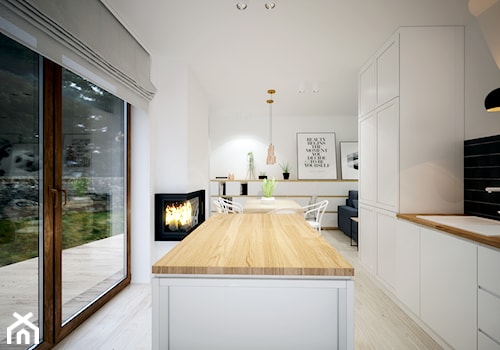 Europejska Resident - Średnia otwarta z salonem biała z zabudowaną lodówką z nablatowym zlewozmywakiem kuchnia jednorzędowa z wyspą lub półwyspem z oknem, styl skandynawski - zdjęcie od Studio projektowania wnętrz''Studio Aranżacji''