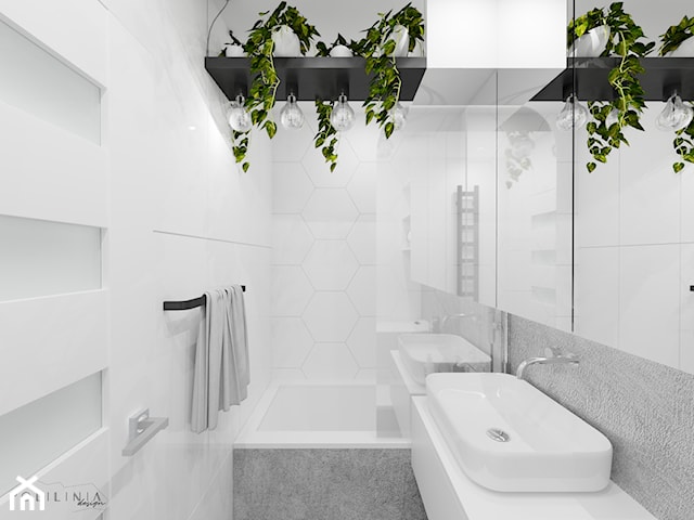 Jasna łazienka z dekoracyjną zielenią