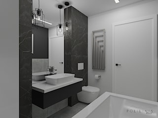 Czarno biała łazienka z płytkami w marmurowy wzór