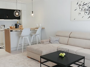 aparatament Mielno - Średni biały salon z kuchnią z jadalnią, styl nowoczesny - zdjęcie od KIECZ.studio projektowe